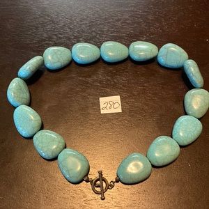 Beautiful bulky faux turquoise necklace.